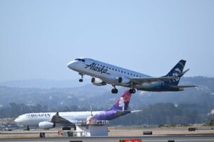 Unlock Hidden Perks: How Alaska and Hawaiian Airlines’ New Atmos Rewards Could Revolutionize Your Travel Game!