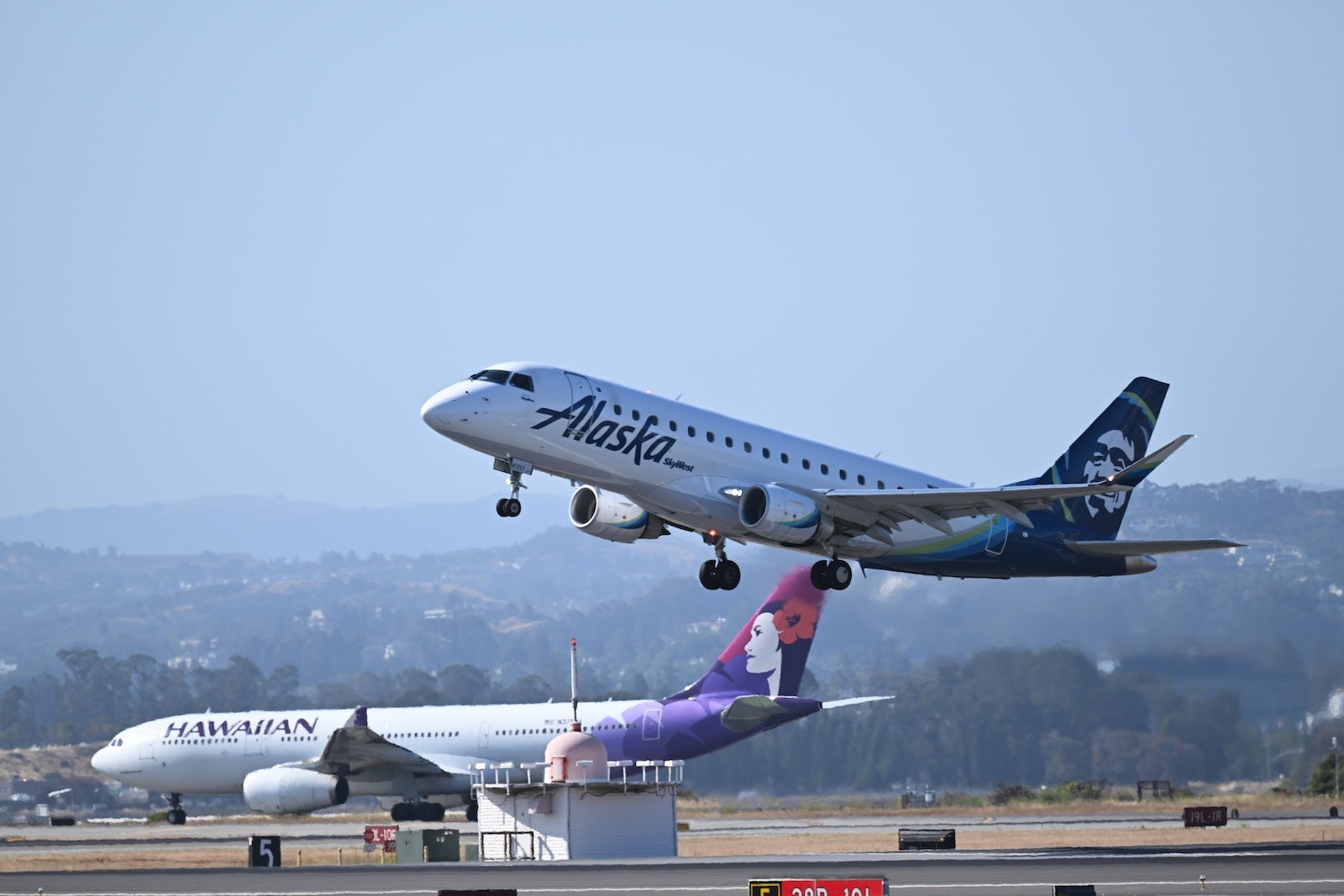 Unlock Hidden Perks: How Alaska and Hawaiian Airlines’ New Atmos Rewards Could Revolutionize Your Travel Game!