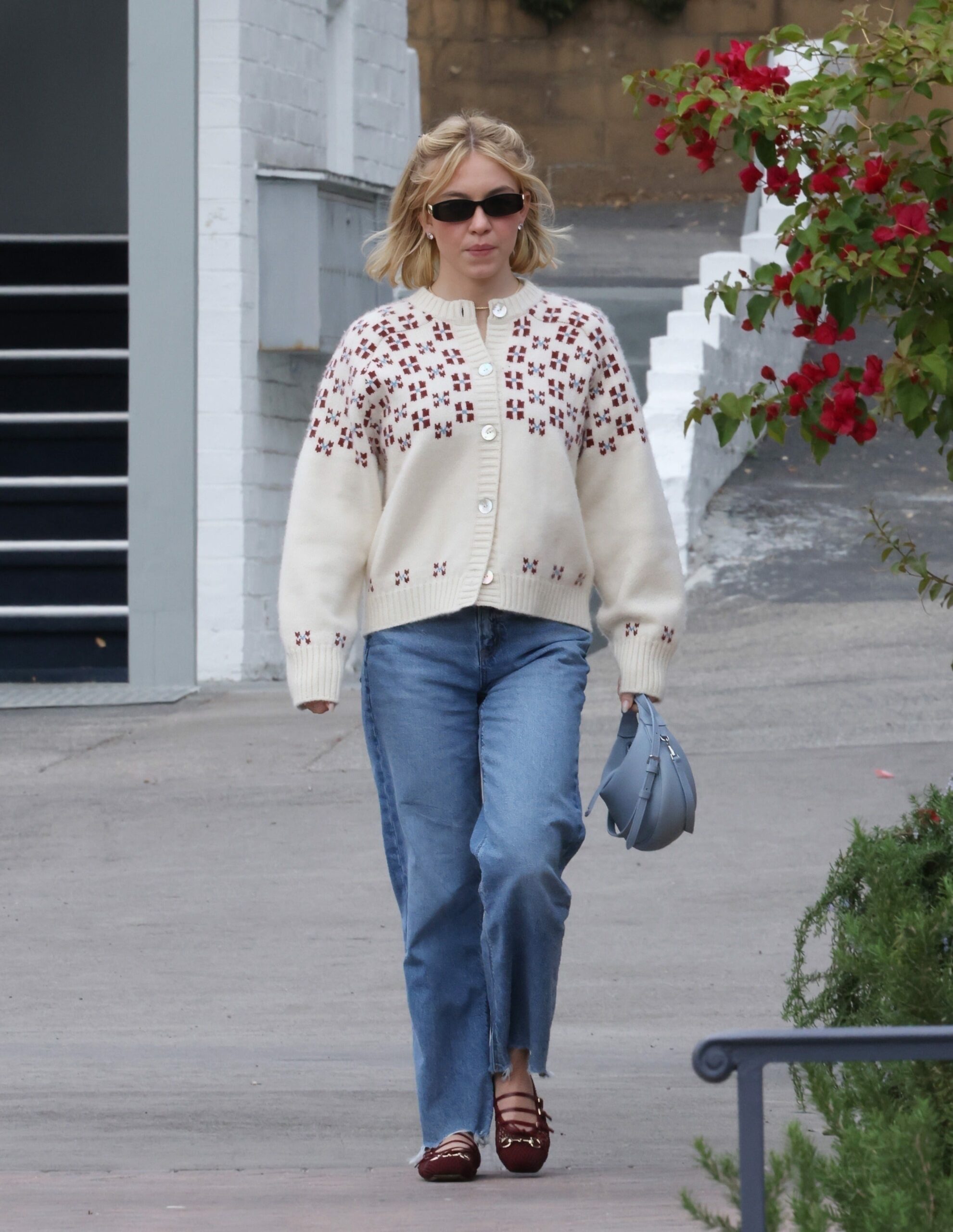 Sydney Sweeney’s Retro Bob and Cozy Sweater Combo—The Unexpected Style Hack You Need This Fall!