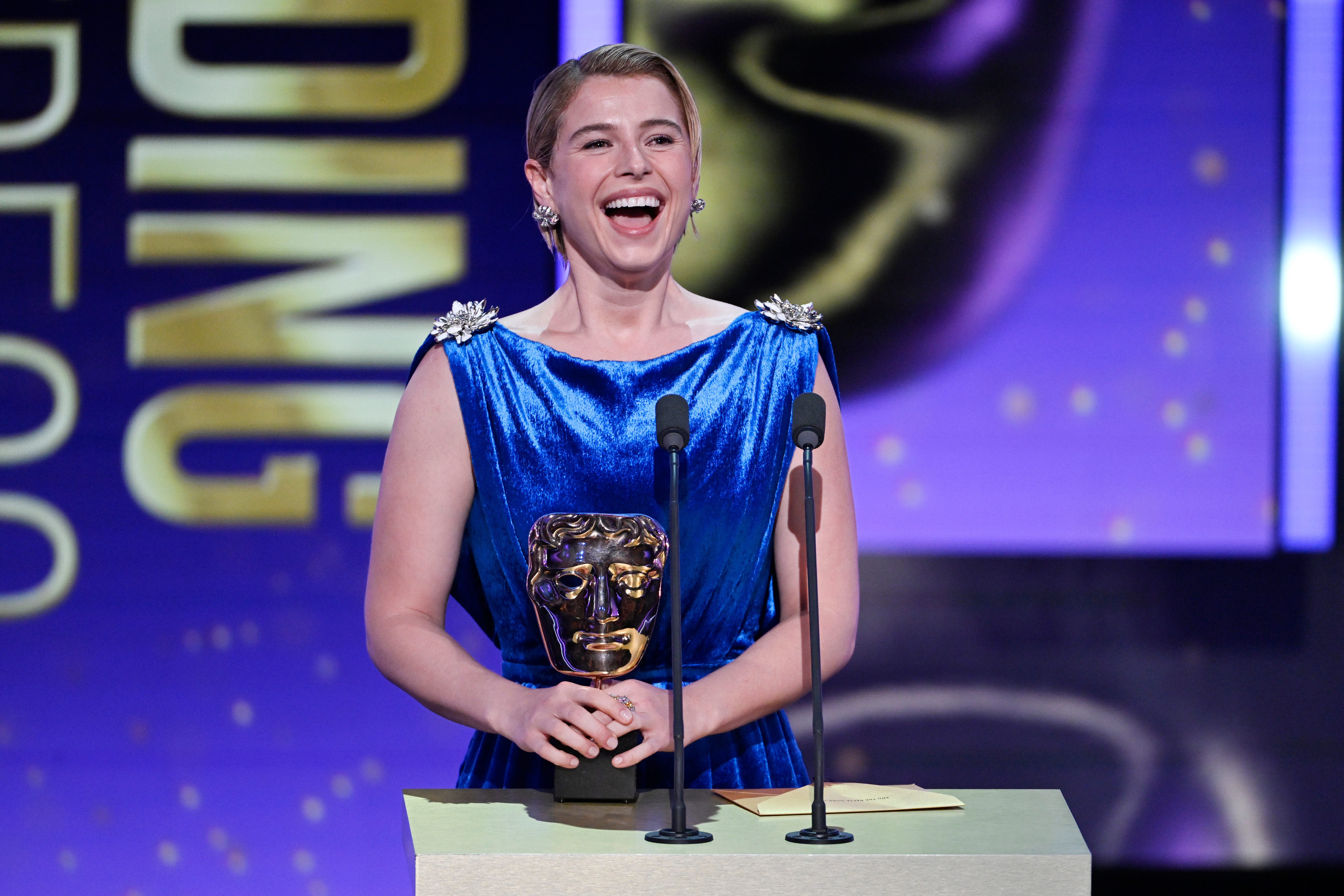 Jessie Buckley Stuns the BAFTAs in a Custom Blue Chanel—Here’s Why Everyone’s Talking About Her Stunning Win!