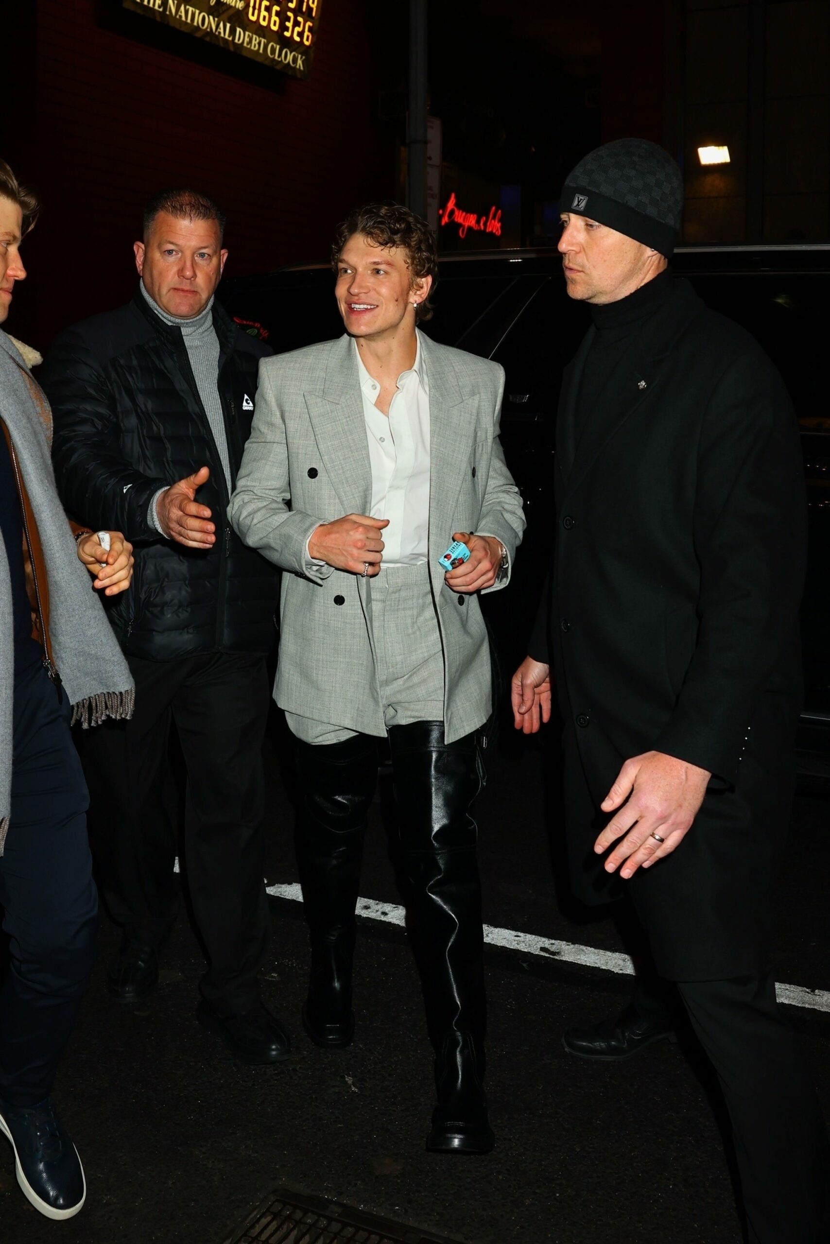 Connor Storrie’s Bold SNL Debut: How Saint Laurent’s Thigh-High Boots Set the Fashion World on Fire