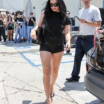 Charli XCX’s Bold Micro Shorts Look Is Backed by a Shoe Trend You Didn’t See Coming—Here’s Why It’s Exploding Again