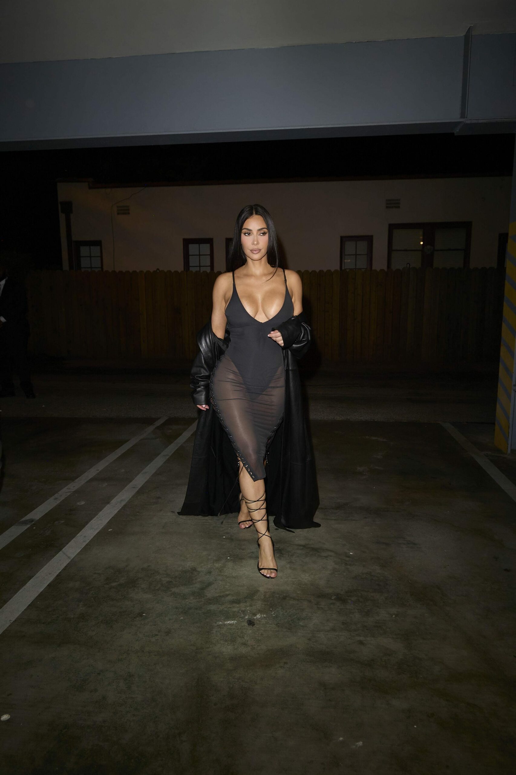 Kim Kardashian’s Stunning Black Bodycon Look at New Pop-Up Event Has Everyone Talking—Discover the Secret Behind Her Show-Stopping Style!