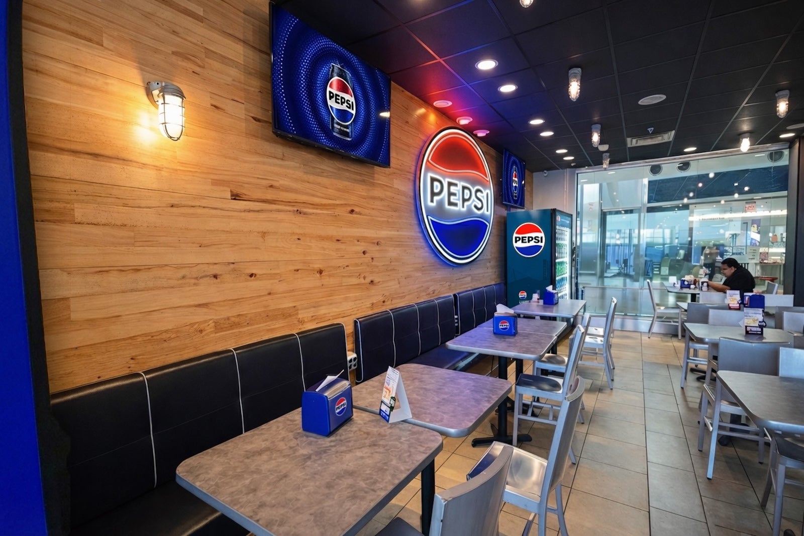 Step Inside the New Airport Lounge That’s Free to Enter — But Banishes Diet Coke and Turns Airport Snacking on Its Head