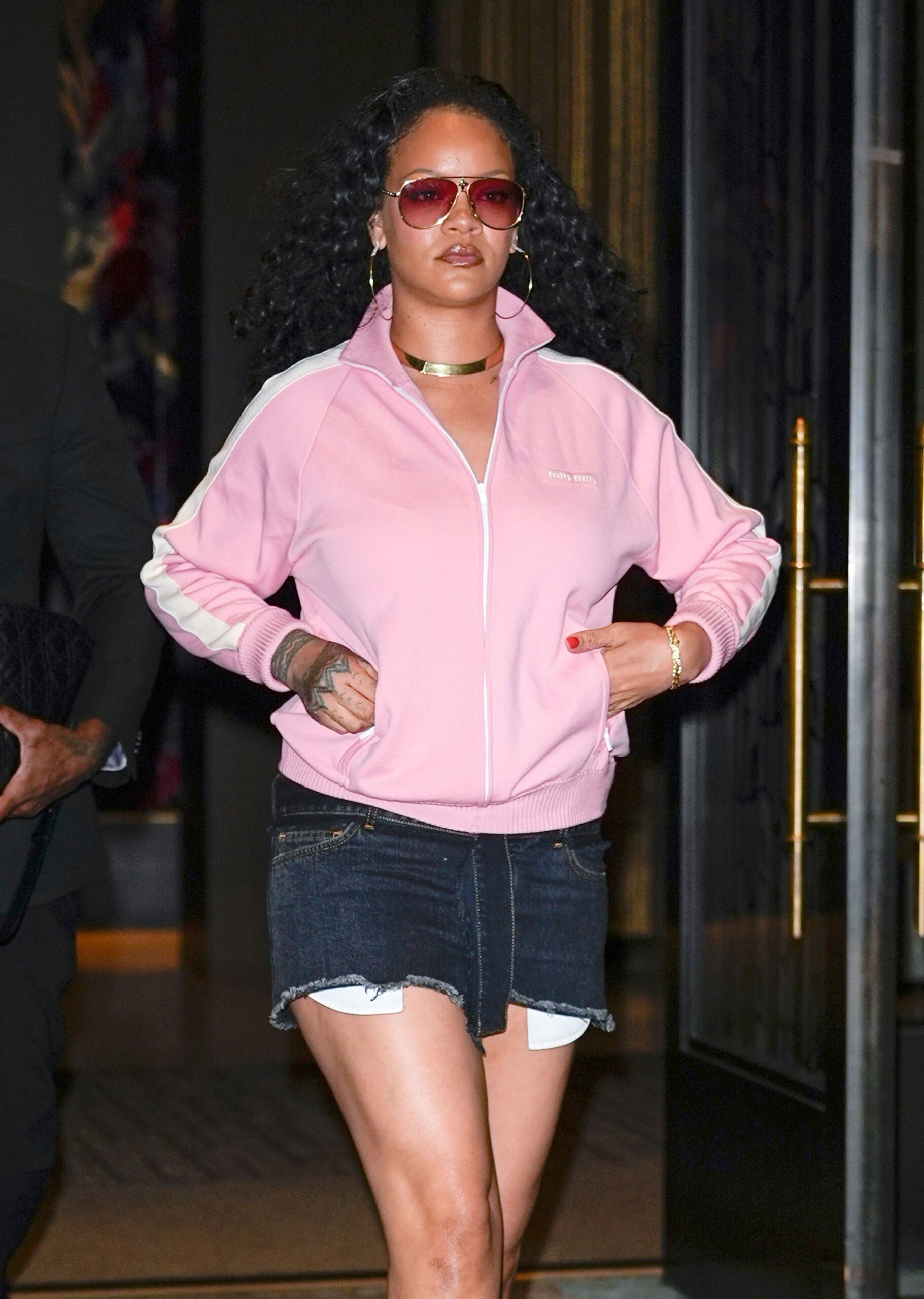 Rihanna’s Bold Y2K Throwback: How Her Cotton Candy-Pink Jacket and Tiny Skirt Are Rewriting Sporty Chic Rules—And What It Means for Your Fitness Style!