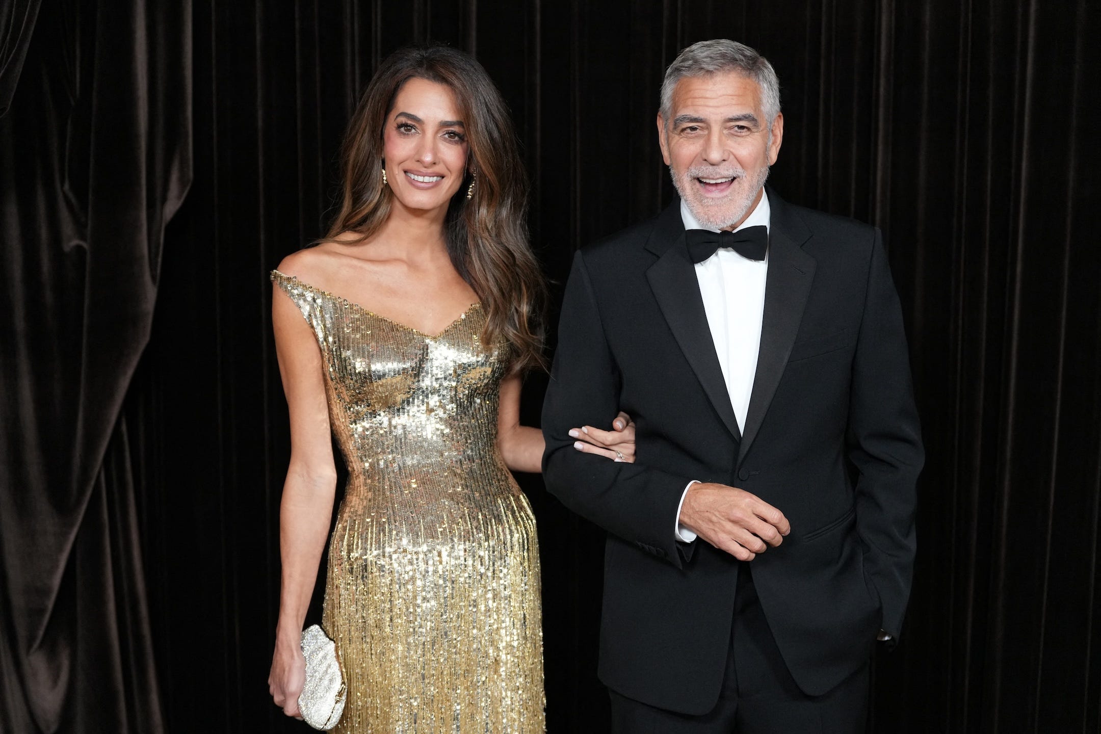 Amal Clooney’s Dazzling Gold Gown at the Albies: The Shocking Twist Everyone Missed!