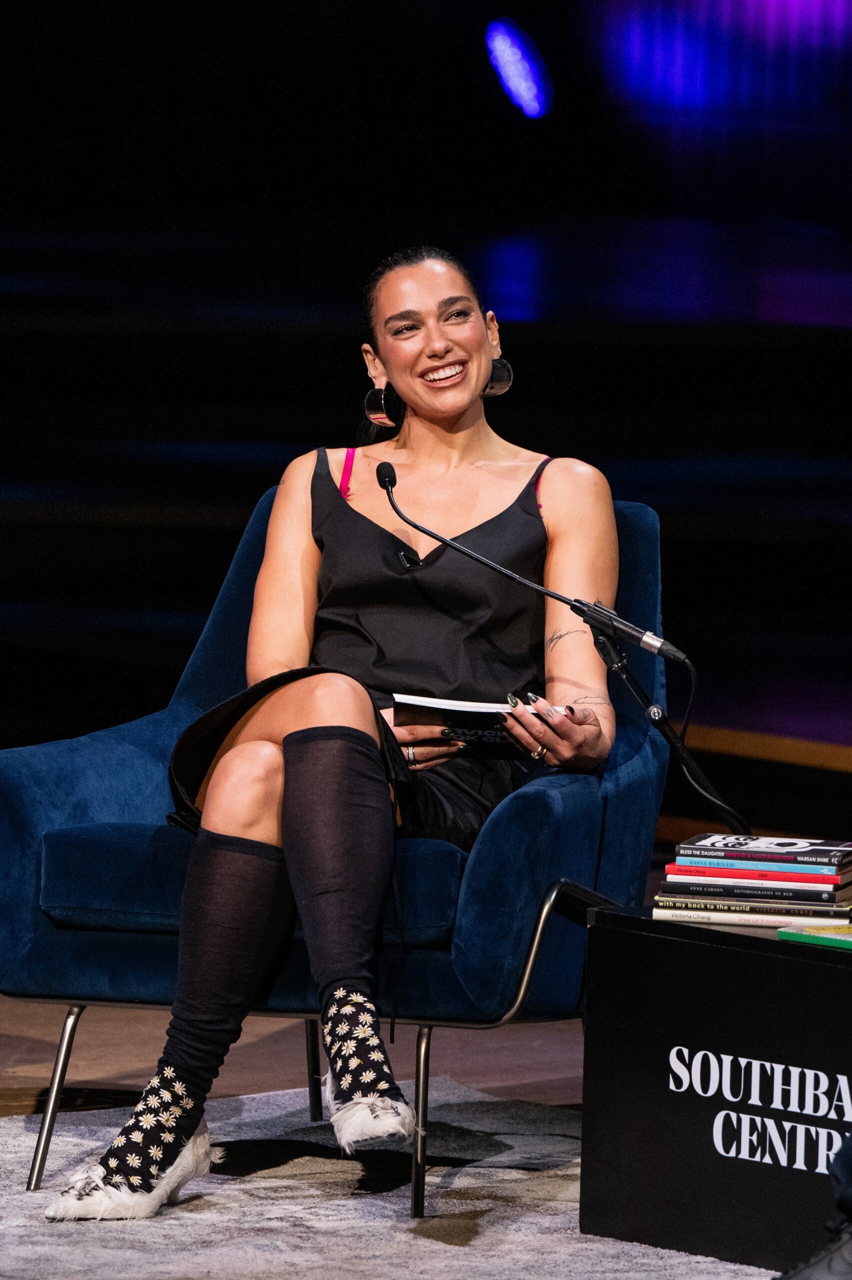 Dua Lipa's Festival Footwear Reveal: The Unexpected Shoe Secrets Powering Her Prada and Chanel Looks You Can’t Miss